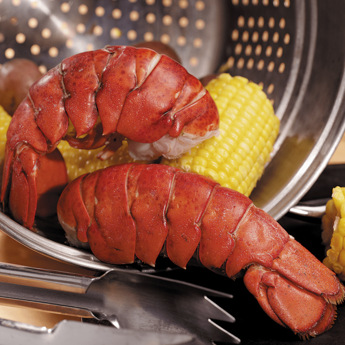 A premium Surf & Turf package containing 4 lobster tails and 4 fillet mignon steaks.