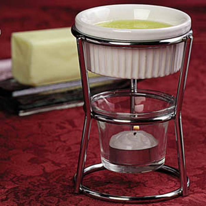Two butter warmers with small handles and a pouring spout, perfect for melting and serving butter.