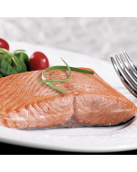 Freshly packed Silver Salmon fillets displayed on a clean surface.