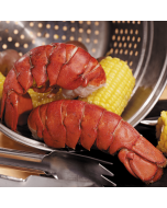 A premium Surf & Turf package containing 4 lobster tails and 4 fillet mignon steaks.