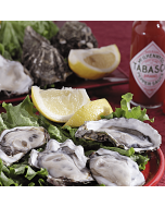 A batch of freshly cleaned oysters in their natural shells, prepared using high pressure cleaning method.