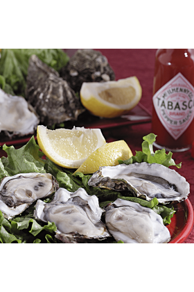 A batch of freshly cleaned oysters in their natural shells, prepared using high pressure cleaning method.