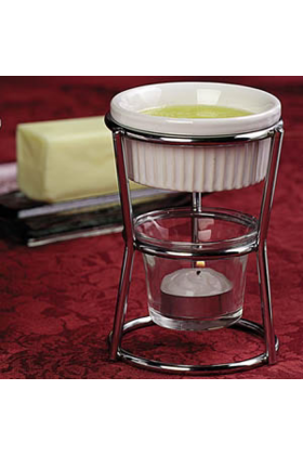 Two butter warmers with small handles and a pouring spout, perfect for melting and serving butter.