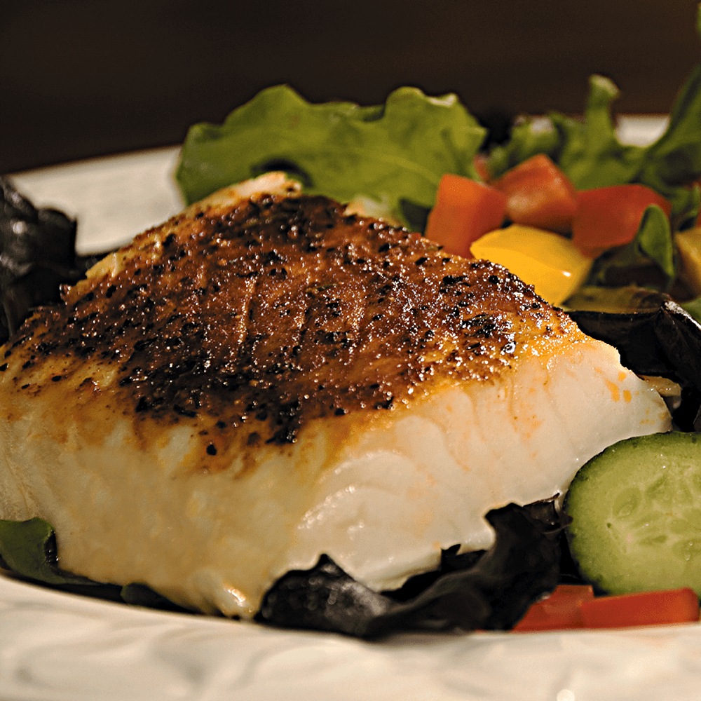 A fresh Alaskan True Cod fish product, known for its white and flaky texture.