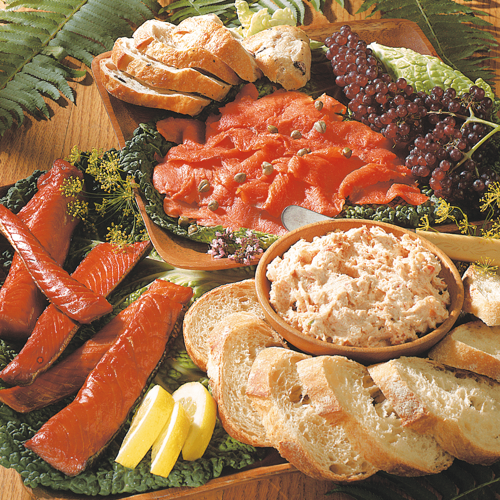 A variety of smoked meats presented in the Smokehouse Sampler product.